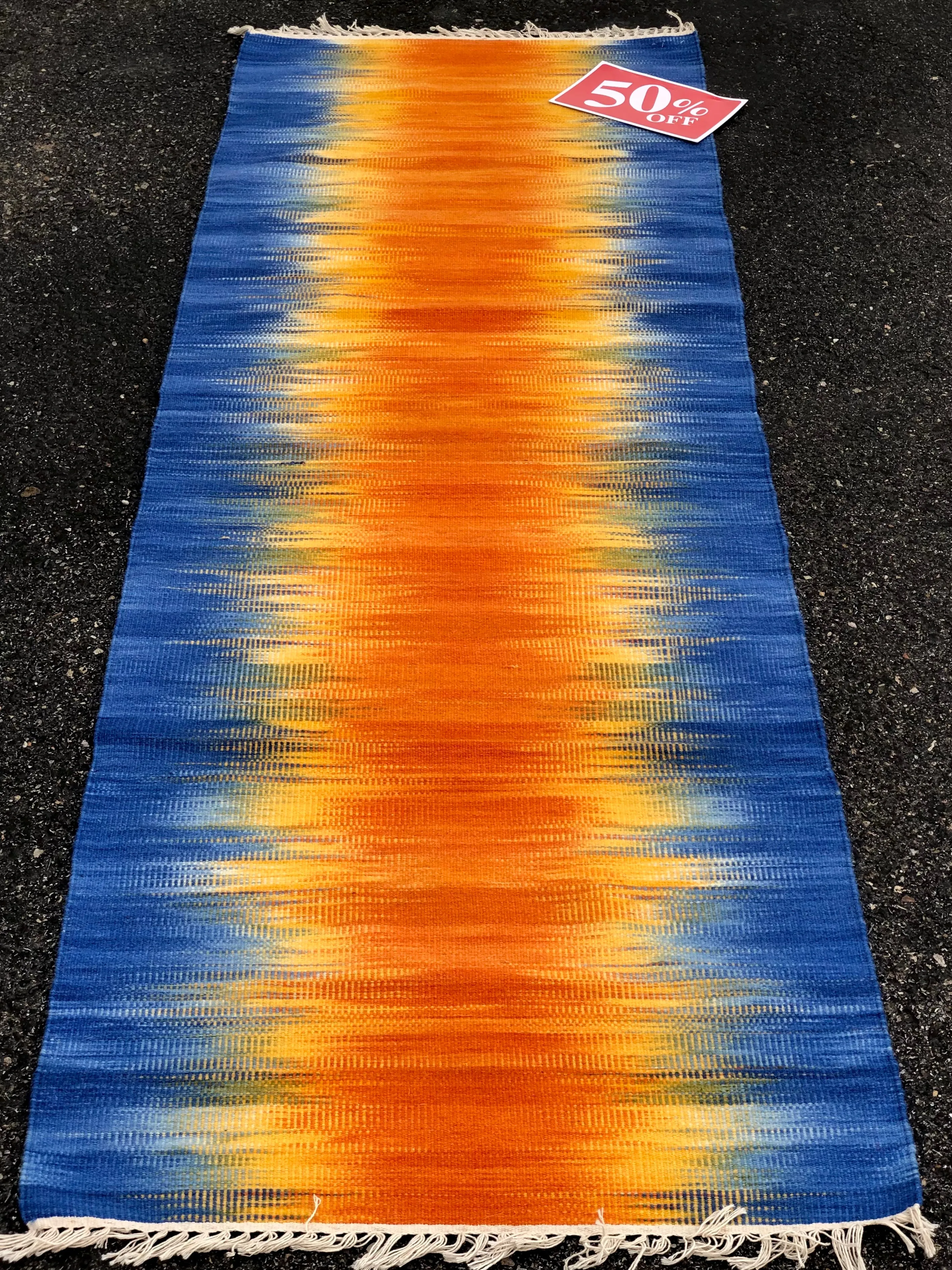 Ikat design Blue Rust  Handwoven wool rug. Save 50% at checkout with code SAVE50